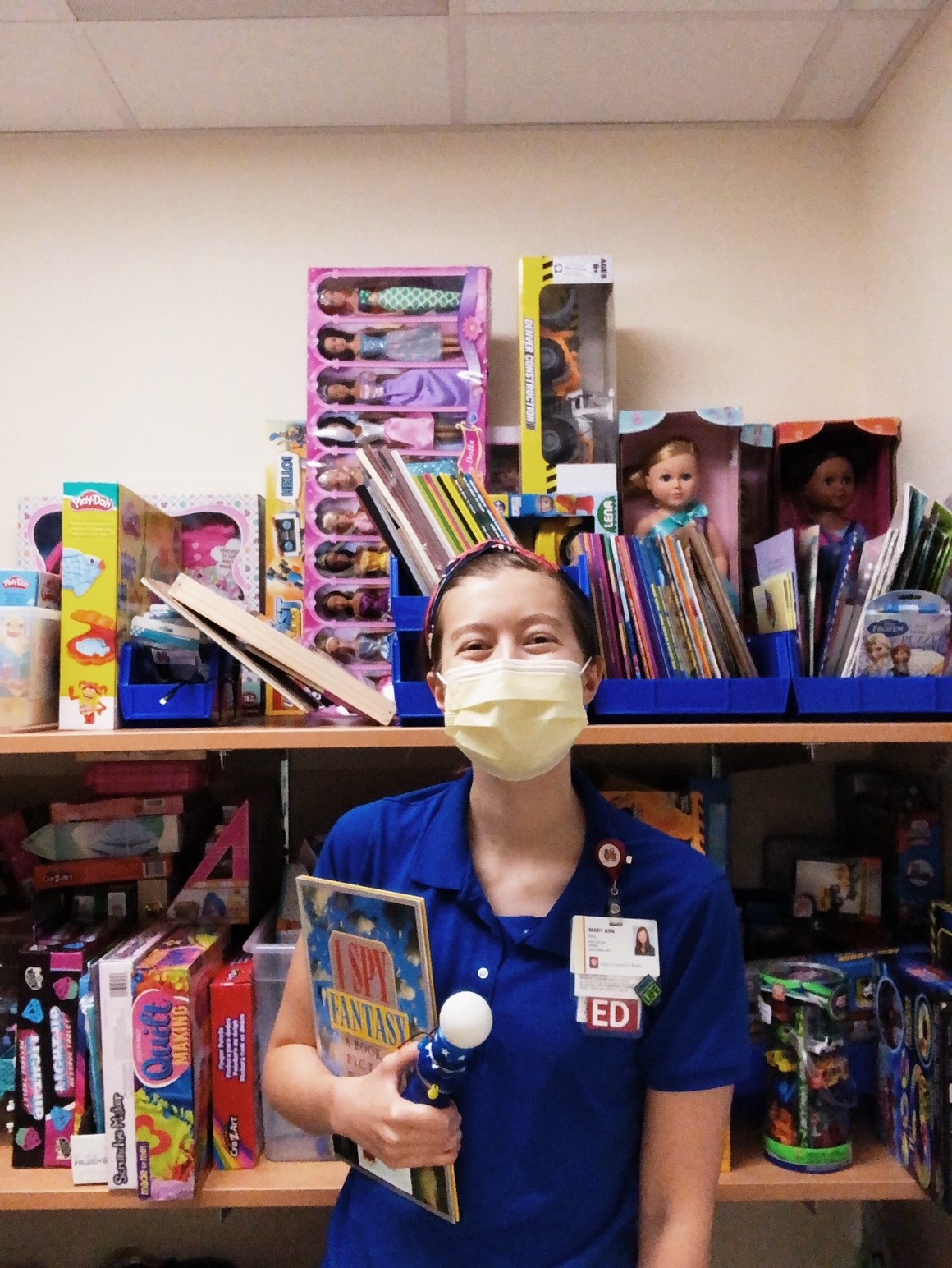 Mary Ann Gill on last day of internship posing with some of her favorite distraction tools (1)